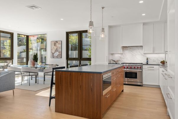 Dining room, Interior, Kitchen, Marble Walls, Pendant Lights, Recessed Lighting, Stainless Steel Appliances, Wood Texture Flooring