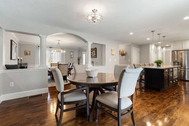 Chandelier, Dining room, Interior, Kitchen, Pendant Lights, Recessed Lighting, Stainless Steel Appliances, Wood Texture Flooring