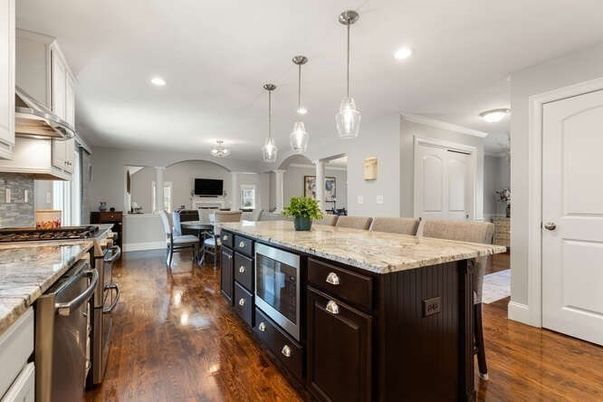Dining room, Interior, Kitchen, Living room, Pendant Lights, Recessed Lighting, Stainless Steel Appliances, Wood Texture Flooring