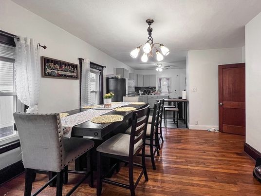 Chandelier, Dining room, Interior, Kitchen, Stainless Steel Appliances, Wood Texture Flooring