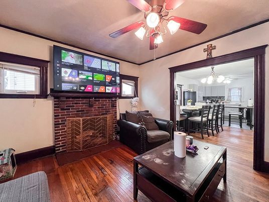 Dining room, Fireplace, Interior, Living room, Pendant Lights, Stone Walls, Wood Texture Flooring