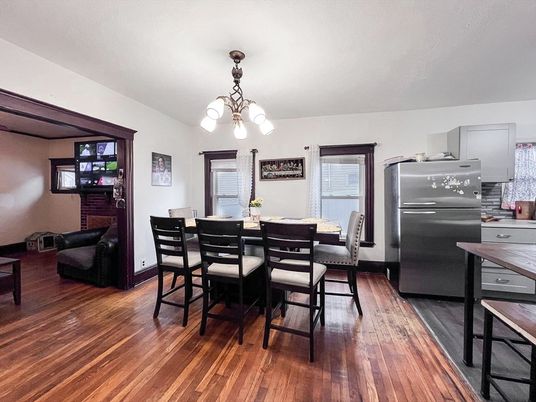 Chandelier, Dining room, Interior, Kitchen, Pendant Lights, Stainless Steel Appliances, Wood Texture Flooring