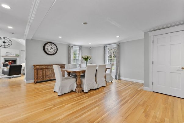 Dining room, Fireplace, Interior, Living room, Recessed Lighting, Wood Texture Flooring