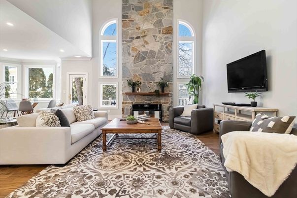 Fireplace, Interior, Living room, Recessed Lighting, Stone Walls, Wood Texture Flooring