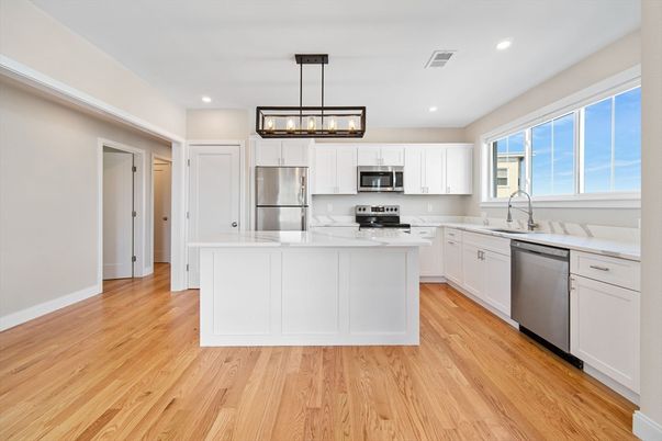 Interior, Kitchen, Pendant Lights, Recessed Lighting, Stainless Steel Appliances, Wood Texture Flooring