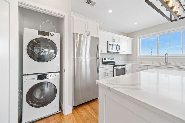 Interior, Kitchen, Recessed Lighting, Utility Closets, Washer, Wood Texture Flooring