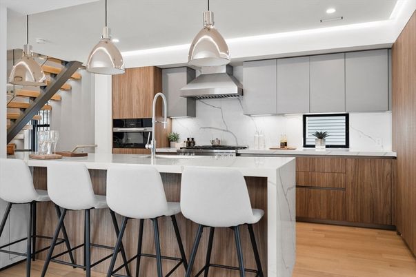 Interior, Kitchen, Marble Walls, Pendant Lights, Recessed Lighting, Stainless Steel Appliances, Wood Texture Flooring