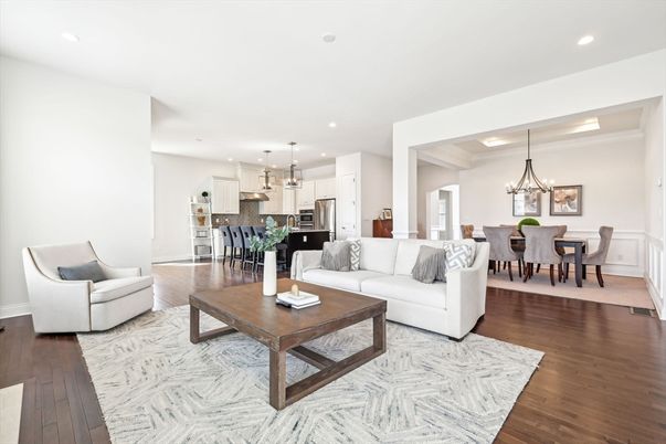 Chandelier, Dining room, Interior, Kitchen, Living room, Pendant Lights, Recessed Lighting, Stainless Steel Appliances, Wood Texture Flooring