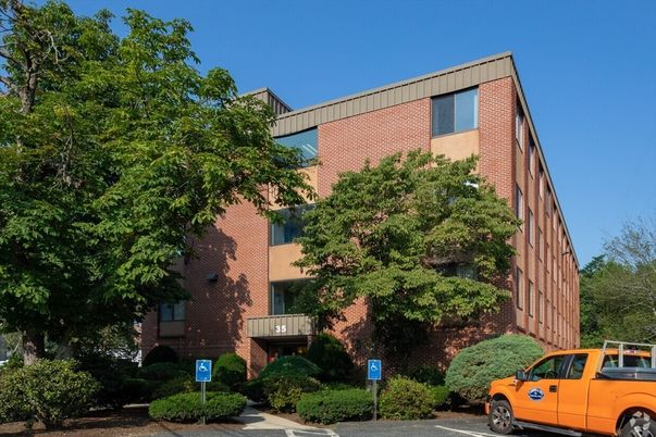 Exterior, Facade, Brick Facade, Condo Building