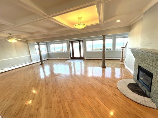 Empty room, Fireplace, Interior, Recessed Lighting, Water, Wood Texture Flooring