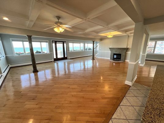 Empty room, Fireplace, Interior, Recessed Lighting, Water, Wood Texture Flooring