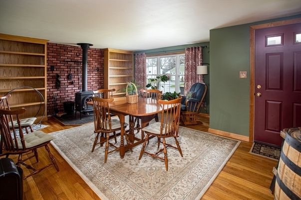Dining room, Fireplace, Interior, Stone Walls, Wood Texture Flooring