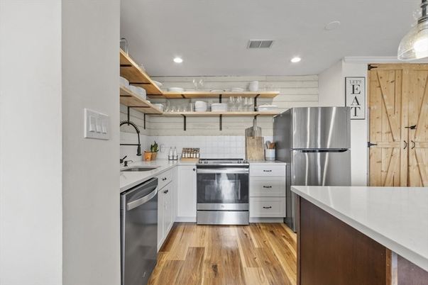 Interior, Kitchen, Recessed Lighting, Stainless Steel Appliances, Wood Texture Flooring