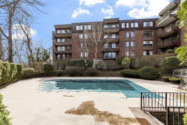 Exterior, Facade, Brick Facade, Pool, Condo Building