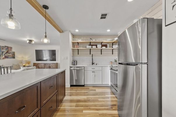 Interior, Kitchen, Pendant Lights, Recessed Lighting, Stainless Steel Appliances, Wood Texture Flooring
