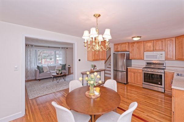 Chandelier, Dining room, Interior, Kitchen, Living room, Stainless Steel Appliances, Wood Texture Flooring