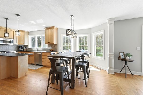 Dining room, Interior, Kitchen, Pendant Lights, Recessed Lighting, Stainless Steel Appliances, Wood Texture Flooring