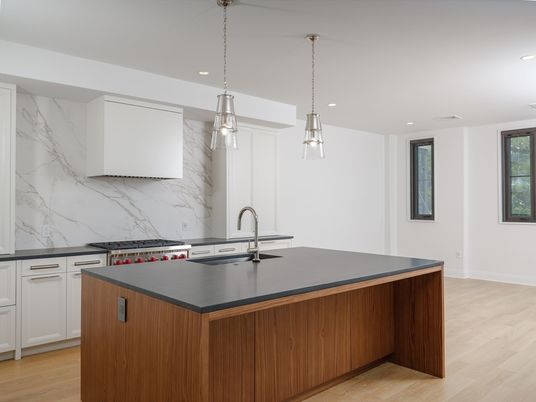 Interior, Kitchen, Marble Walls, Pendant Lights, Recessed Lighting, Stainless Steel Appliances, Wood Texture Flooring