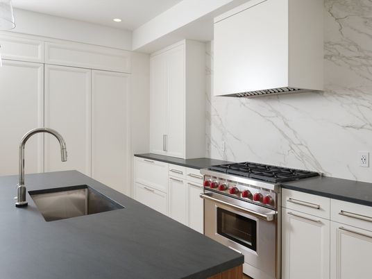 Interior, Kitchen, Marble Walls, Recessed Lighting, Stainless Steel Appliances