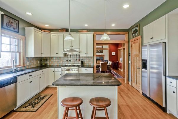 Dining room, Interior, Kitchen, Pendant Lights, Recessed Lighting, Stainless Steel Appliances, Wood Texture Flooring