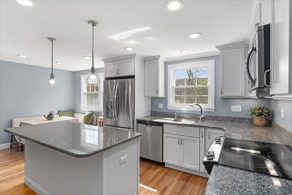 Dining room, Interior, Kitchen, Pendant Lights, Recessed Lighting, Stainless Steel Appliances, Wood Texture Flooring