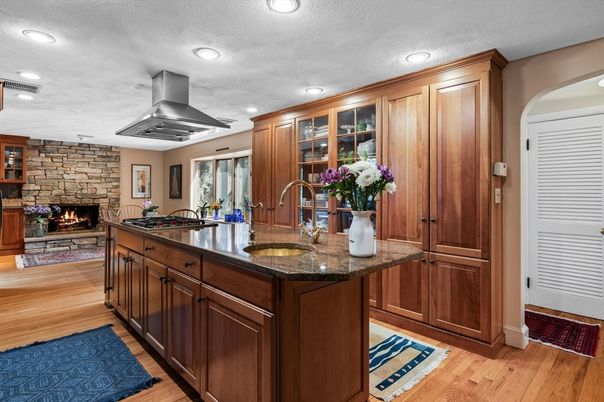 Fireplace, Interior, Kitchen, Recessed Lighting, Stone Walls, Wood Texture Flooring