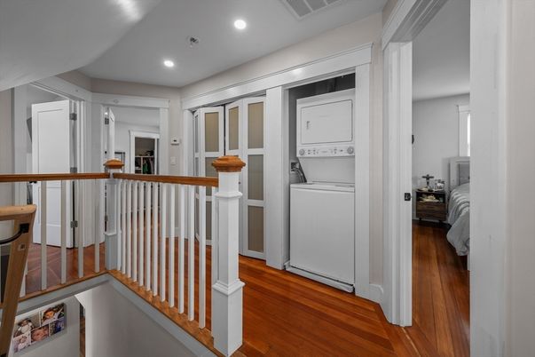 Bedroom, Interior, Recessed Lighting, Utility Closets, Washer, Wood Texture Flooring