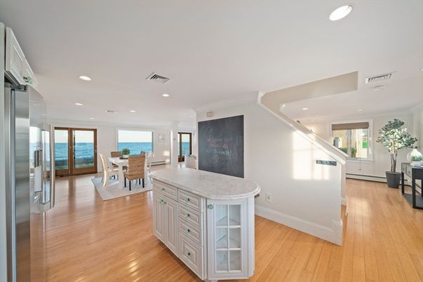 Dining room, Interior, Kitchen, Recessed Lighting, Stainless Steel Appliances, Water, Wood Texture Flooring