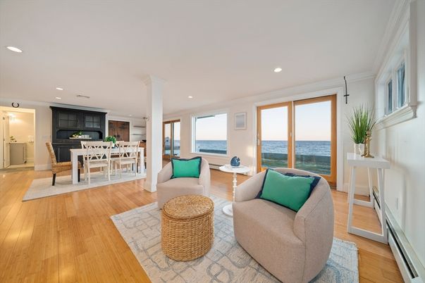 Dining room, Fireplace, Interior, Living room, Recessed Lighting, Water, Wood Texture Flooring