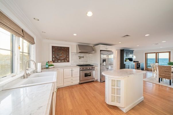 Dining room, Interior, Kitchen, Recessed Lighting, Stainless Steel Appliances, Water, Wood Texture Flooring