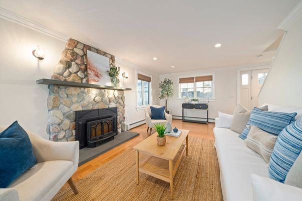 Fireplace, Interior, Living room, Recessed Lighting, Stone Walls, Wood Texture Flooring
