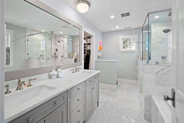 Bathroom, Dual Sink Vanities, Glass Shower, Interior, Marble, Marble Walls, Recessed Lighting