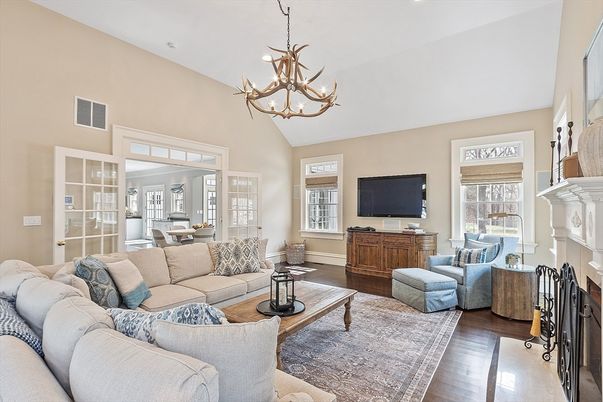 Chandelier, Fireplace, Interior, Living room, Recessed Lighting, Wood Texture Flooring