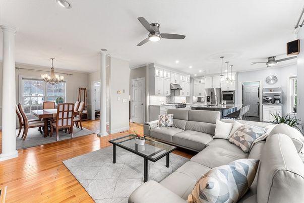 Chandelier, Dining room, Interior, Kitchen, Living room, Pendant Lights, Recessed Lighting, Stainless Steel Appliances, Wood Texture Flooring