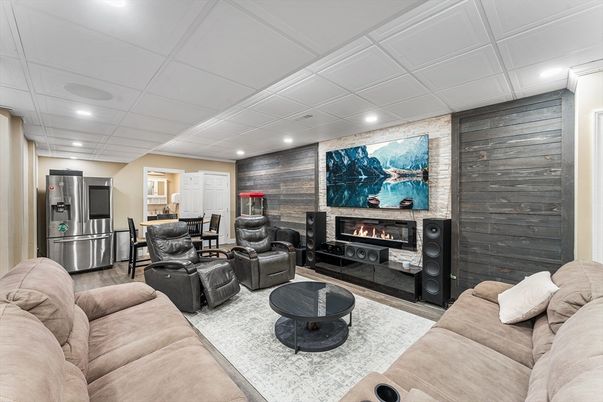 Fireplace, Interior, Kitchen, Living room, Recessed Lighting, Stone Walls, Wood Texture Flooring