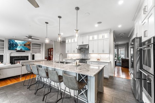 Fireplace, Interior, Kitchen, Living room, Pendant Lights, Recessed Lighting, Stainless Steel Appliances, Wood Texture Flooring