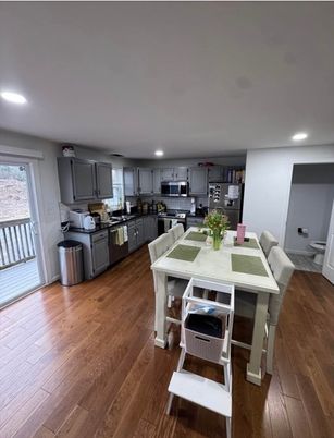 Dining room, Interior, Kitchen, Recessed Lighting, Stainless Steel Appliances, Wood Texture Flooring