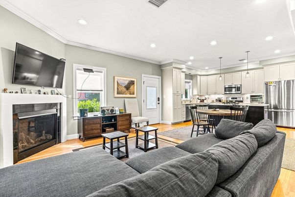 Dining room, Fireplace, Interior, Kitchen, Living room, Pendant Lights, Recessed Lighting, Stainless Steel Appliances, Wood Texture Flooring