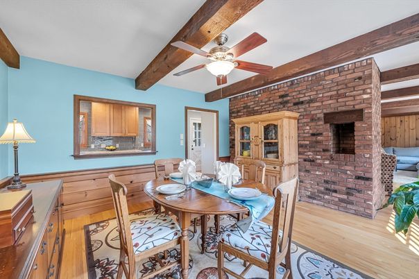 Dining room, Fireplace, Interior, Stone Walls, Wooden Beams, Wood Texture Flooring