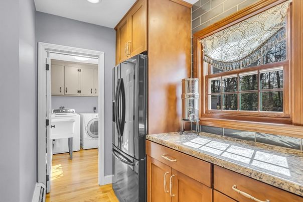 Interior, Kitchen, Recessed Lighting, Washer, Wood Texture Flooring