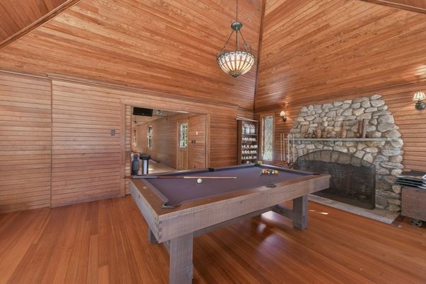 Billiard Table, Fireplace, Game Room, Interior, Pendant Lights, Stone Walls, Wooden Ceilings, Wood Texture Flooring, Wooden Walls