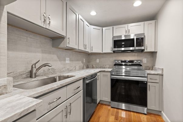 Interior, Kitchen, Recessed Lighting, Stainless Steel Appliances, Wood Texture Flooring