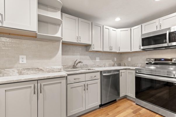 Interior, Kitchen, Recessed Lighting, Stainless Steel Appliances, Wood Texture Flooring