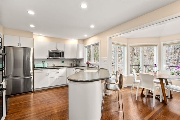 Dining room, Interior, Kitchen, Recessed Lighting, Stainless Steel Appliances, Wood Texture Flooring