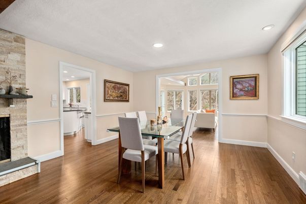 Dining room, Fireplace, Interior, Recessed Lighting, Stone Walls, Wood Texture Flooring