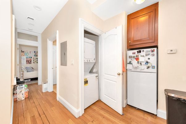 Bedroom, Interior, Recessed Lighting, Utility Closets, Washer, Wood Texture Flooring