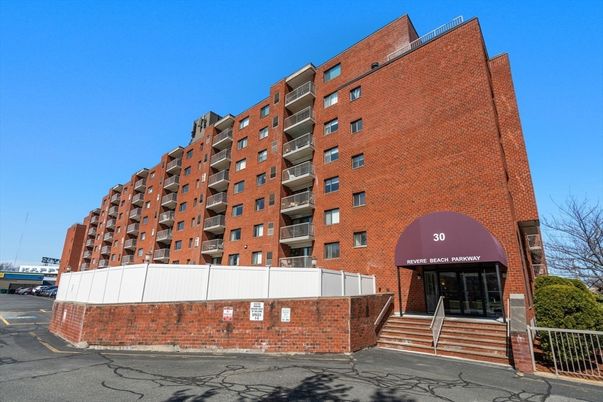 Exterior, Facade, Brick Facade, Condo Building
