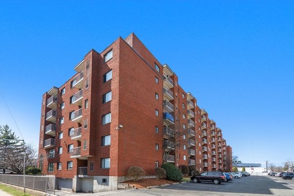 Exterior, Facade, Brick Facade, Condo Building