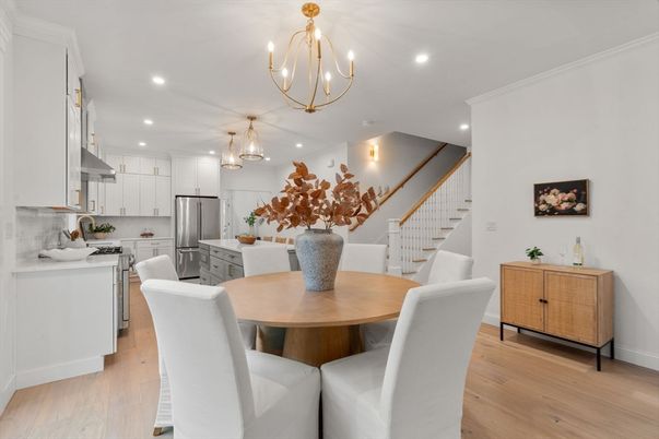 Chandelier, Dining room, Interior, Kitchen, Pendant Lights, Recessed Lighting, Stainless Steel Appliances, Wood Texture Flooring