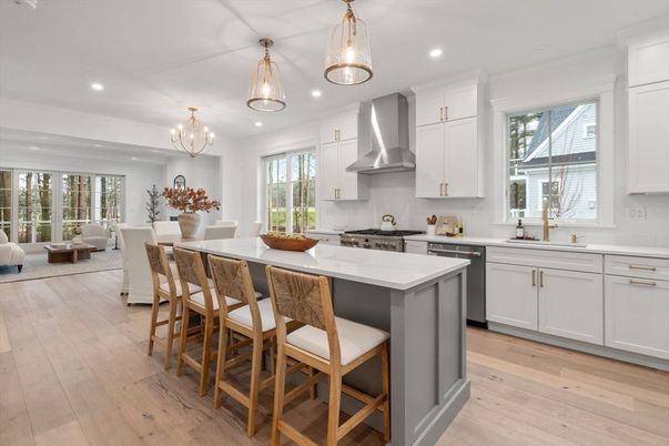 Chandelier, Dining room, Interior, Kitchen, Living room, Pendant Lights, Recessed Lighting, Stainless Steel Appliances, Wood Texture Flooring